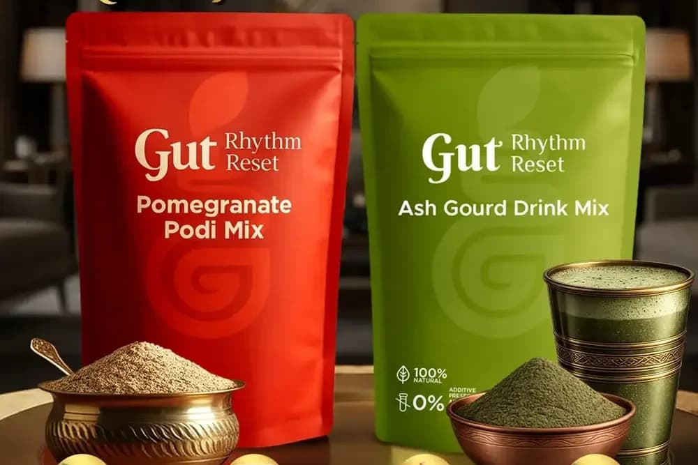 Acid Healer Combo: Pomegranate Podi Mix and Ash Gourd Drink Mix pouches with a brass bowl and tumbler